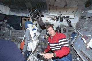 Krikalev prepares to talk to school children during the Shuttle Amateur 